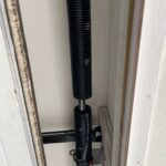 Broken Garage Door Spring Detail
